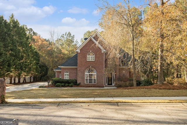1418 Brighton Pl, Loganville, GA 30052 - view of front facade featuring brick siding