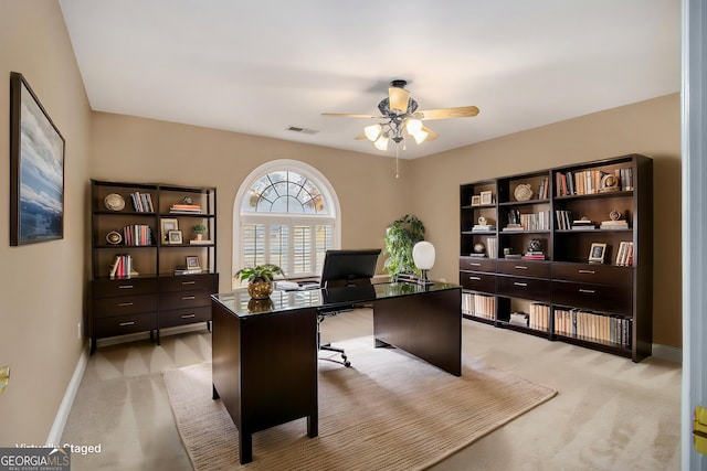 1418 Brighton Pl, Loganville, GA 30052 - office area featuring light carpet, a ceiling fan, and baseboards