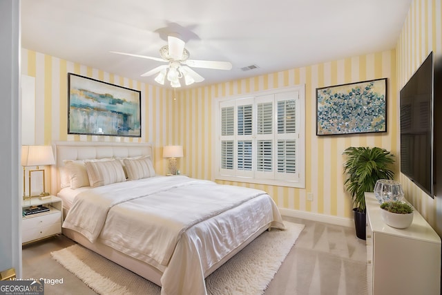1418 Brighton Pl, Loganville, GA 30052 - bedroom featuring wallpapered walls, carpet floors, baseboards, and a ceiling fan