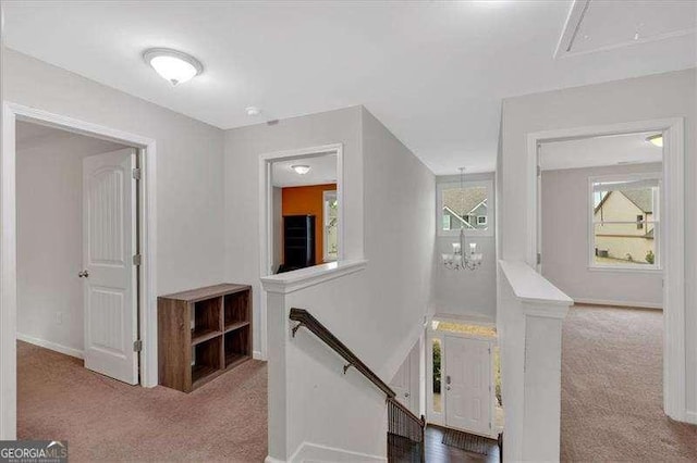 822 Pine Way, Dallas, GA 30157 - hallway with an upstairs landing, carpet flooring, and attic access