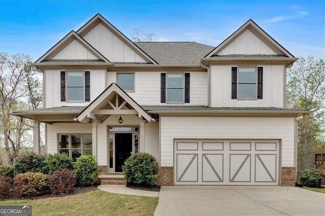 822 Pine Way, Dallas, GA 30157 - craftsman inspired home featuring concrete driveway, a garage, brick siding, and board and batten siding