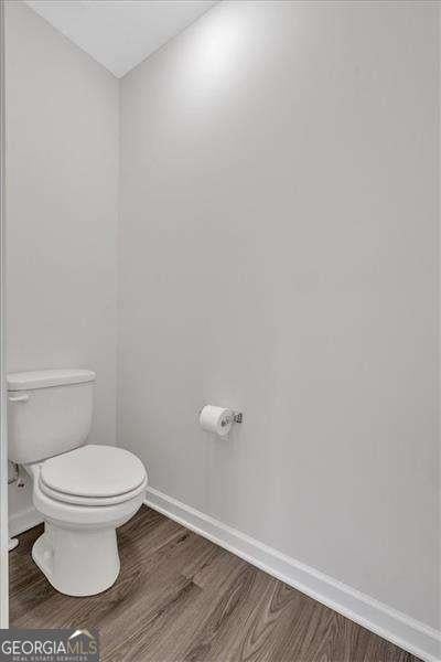 822 Pine Way, Dallas, GA 30157 - bathroom featuring toilet and wood finished floors
