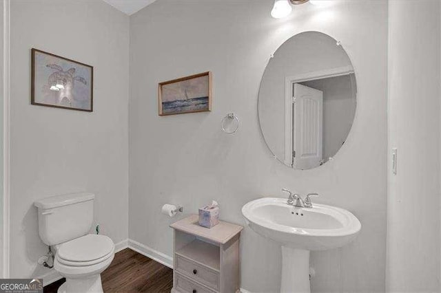 822 Pine Way, Dallas, GA 30157 - half bath with toilet and wood finished floors