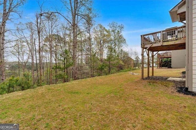 822 Pine Way, Dallas, GA 30157 - view of green lawn featuring a deck