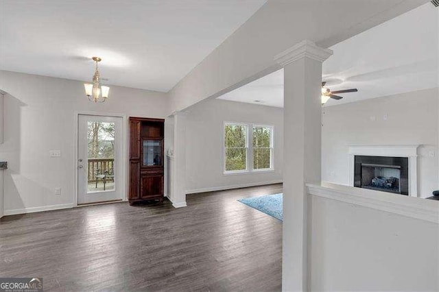 822 Pine Way, Dallas, GA 30157 - foyer entrance with a ceiling fan, wood finished floors, a chandelier, and a fireplace