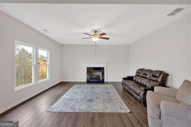 822 Pine Way, Dallas, GA 30157 - living room with ceiling fan, wood finished floors, and a fireplace with flush hearth