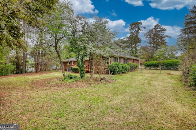 view of yard featuring fence