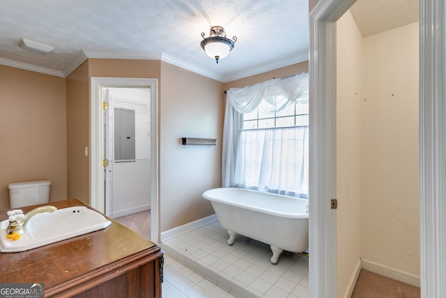 86 S Chattahoochee Dr, Hogansville, GA 30230 - full bathroom featuring a freestanding bath, vanity, crown molding, tile patterned flooring, and a textured ceiling