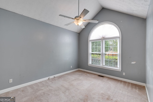 86 S Chattahoochee Dr, Hogansville, GA 30230 - carpeted empty room with lofted ceiling, a ceiling fan, and a textured ceiling