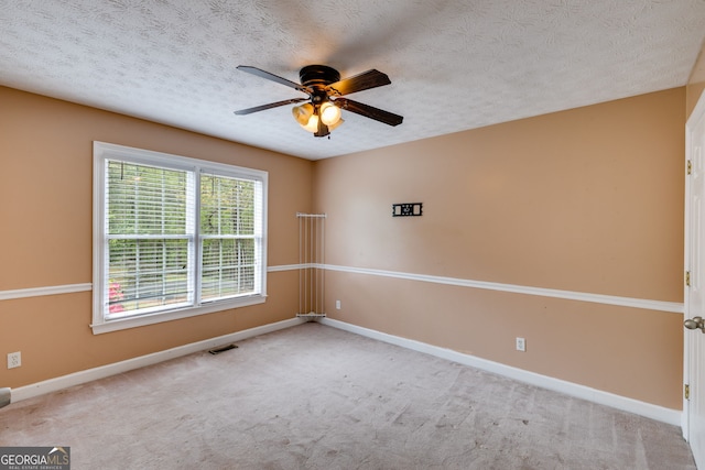 86 S Chattahoochee Dr, Hogansville, GA 30230 - empty room with a ceiling fan, carpet flooring, and a textured ceiling