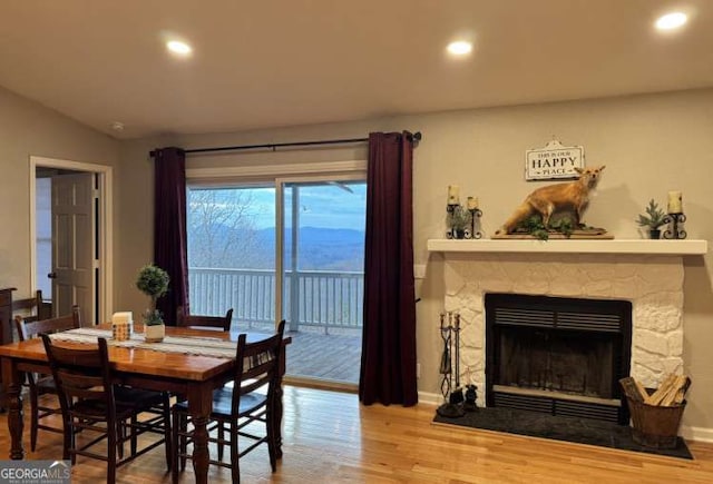7 Lakeview Dr, Hayesville, NC 28904 - dining room with recessed lighting, baseboards, a stone fireplace, and wood finished floors