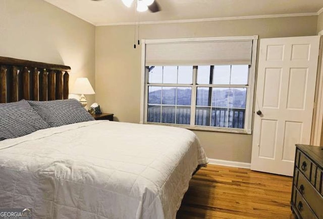 7 Lakeview Dr, Hayesville, NC 28904 - bedroom with baseboards, crown molding, a ceiling fan, and wood finished floors
