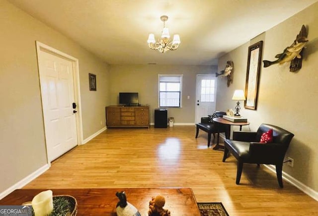 7 Lakeview Dr, Hayesville, NC 28904 - interior space featuring a chandelier, baseboards, and light wood-style floors