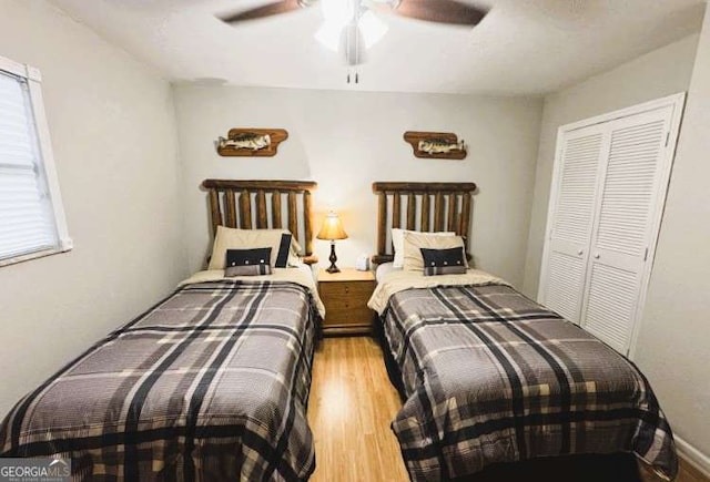 7 Lakeview Dr, Hayesville, NC 28904 - bedroom featuring a closet, wood finished floors, and ceiling fan