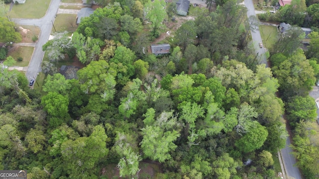drone / aerial view with a forest view