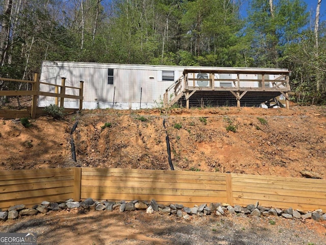 1467 Creek Rd, Hiawassee, GA 30546 - rear view of house with a deck