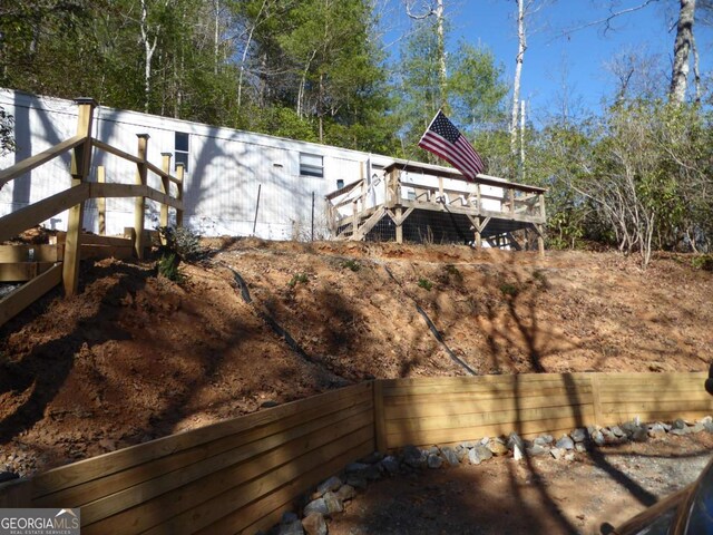 1467 Creek Rd, Hiawassee, GA 30546 - rear view of property featuring stairway and a deck
