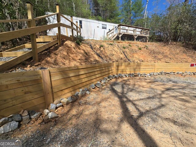 1467 Creek Rd, Hiawassee, GA 30546 - view of yard with a deck
