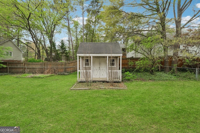 view of shed featuring a fenced backyard