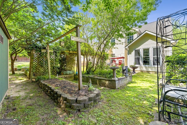 view of yard featuring fence