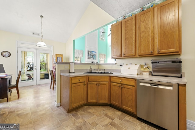 kitchen featuring light countertops, stainless steel dishwasher, french doors, a sink, and decorative light fixtures