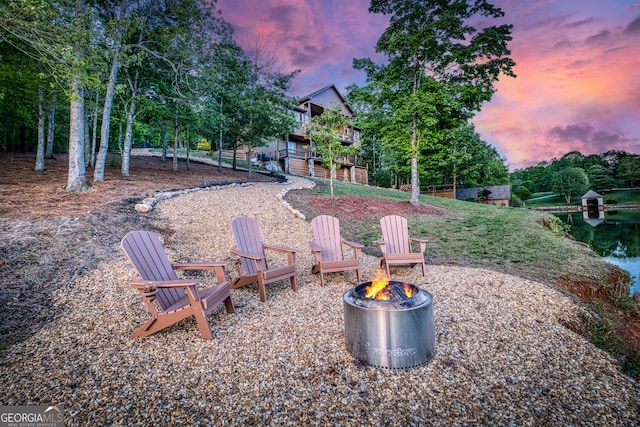97 E Laceola Rd S, Cleveland, GA 30528 - view of yard with a fire pit and a water view