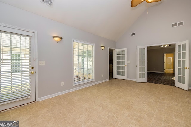 230 Hidden Brook Trl, Fayetteville, GA 30215 - unfurnished room featuring french doors, ceiling fan, healthy amount of natural light, high vaulted ceiling, and baseboards