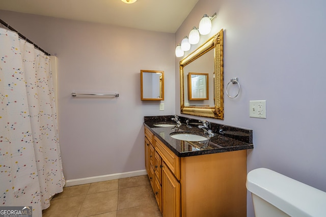 230 Hidden Brook Trl, Fayetteville, GA 30215 - full bathroom featuring double vanity, toilet, tile patterned flooring, baseboards, and curtained shower