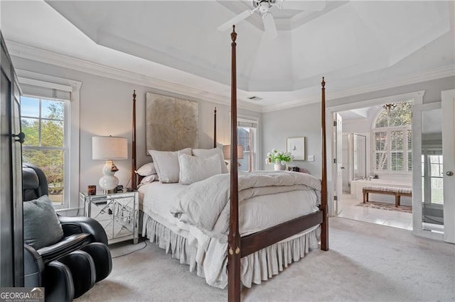 295 Sagamore Cv NW, Sugar Hill, GA 30518 - bedroom featuring a tray ceiling, carpet floors, ornamental molding, ceiling fan, and ensuite bath