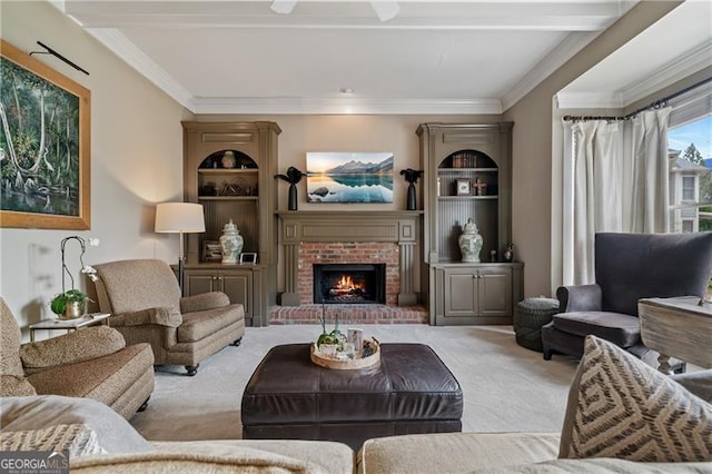 295 Sagamore Cv NW, Sugar Hill, GA 30518 - living room featuring carpet flooring, ornamental molding, a brick fireplace, a ceiling fan, and built in features