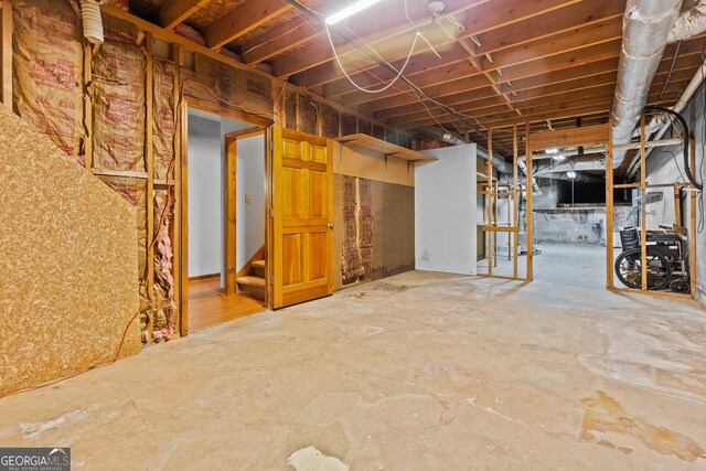 unfinished below grade area with stairway