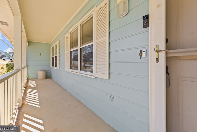 balcony with a porch and visible vents