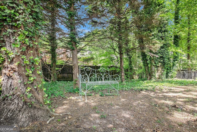 view of gate featuring fence