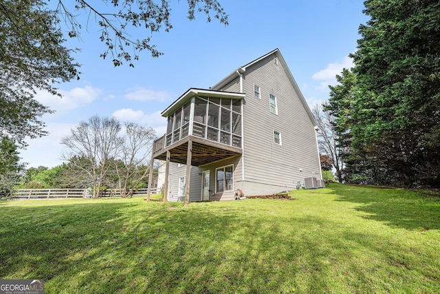 105 Blackberry Ct, Woodstock, GA 30188 - back of house with a sunroom and central AC