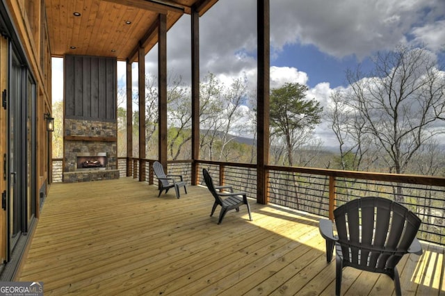 768 Cherokee Cir, Ellijay, GA 30540 - deck featuring a stone fireplace