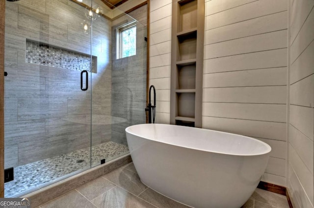 768 Cherokee Cir, Ellijay, GA 30540 - full bath with tile patterned floors, a freestanding bath, and a stall shower