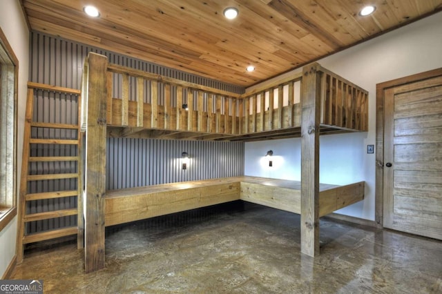 768 Cherokee Cir, Ellijay, GA 30540 - unfurnished bedroom featuring wooden ceiling, concrete flooring, and recessed lighting