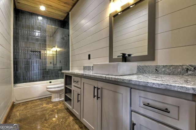 768 Cherokee Cir, Ellijay, GA 30540 - bathroom featuring vanity, toilet, wood ceiling, washtub / shower combination, and wooden walls