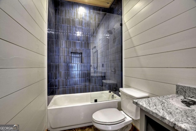 768 Cherokee Cir, Ellijay, GA 30540 - bathroom featuring wood walls, toilet, vanity, and shower / bathtub combination