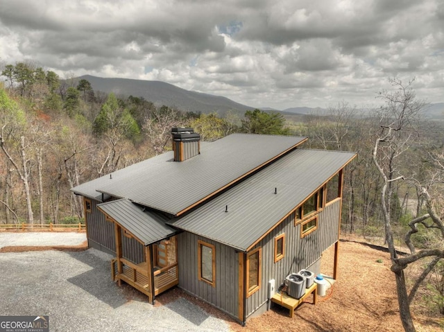 768 Cherokee Cir, Ellijay, GA 30540 - exterior space with central air condition unit, a view of trees, a mountain view, driveway, and metal roof