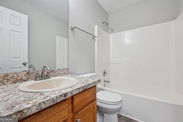 1575 April Ln, Morrow, GA 30260 - full bathroom featuring  shower combination, vanity, toilet, and wood finished floors
