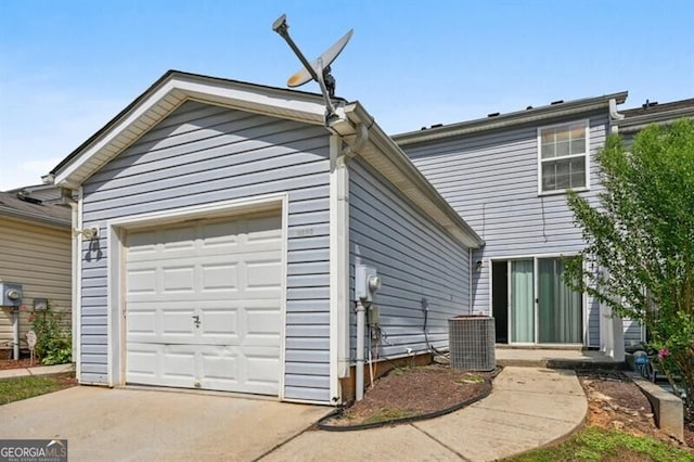 1575 April Ln, Morrow, GA 30260 - view of front of property with driveway, central AC, and an outbuilding