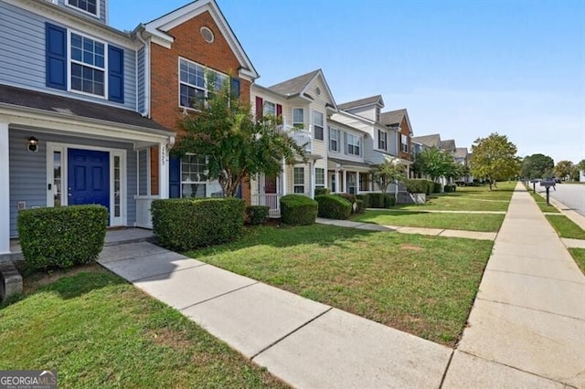 1575 April Ln, Morrow, GA 30260 - view of property with a residential view and a front yard