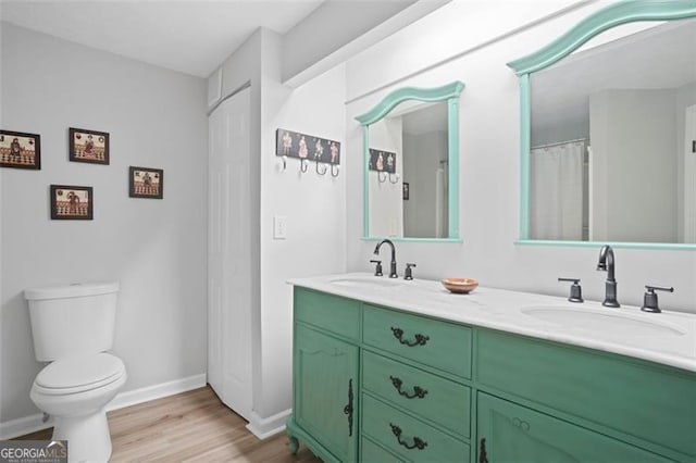 4307 Orchard Park Ct Unit A, Stone Mountain, GA 30083 - full bath featuring wood finished floors and double vanity