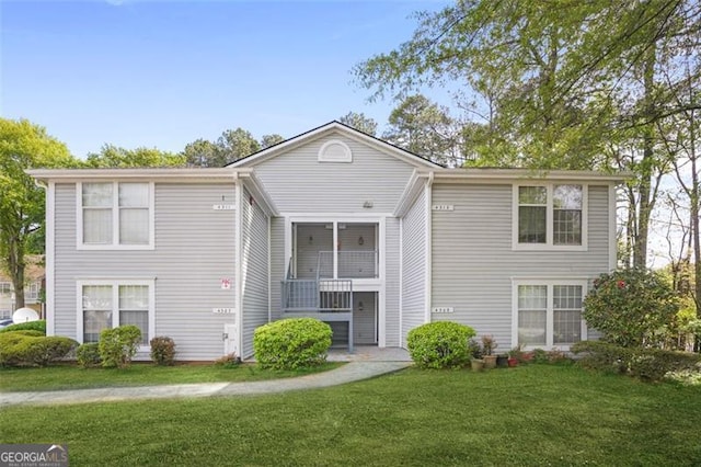 4307 Orchard Park Ct Unit A, Stone Mountain, GA 30083 - view of front facade featuring a front lawn