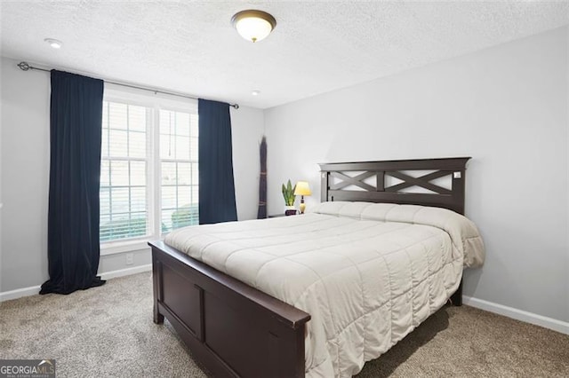 4307 Orchard Park Ct Unit A, Stone Mountain, GA 30083 - bedroom featuring light carpet and a textured ceiling