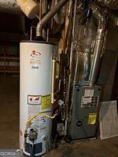 4528 Newcastle Cir, Lithonia, GA 30038 - utility room with gas water heater