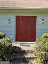 4528 Newcastle Cir, Lithonia, GA 30038 - view of exterior entry featuring roof with shingles