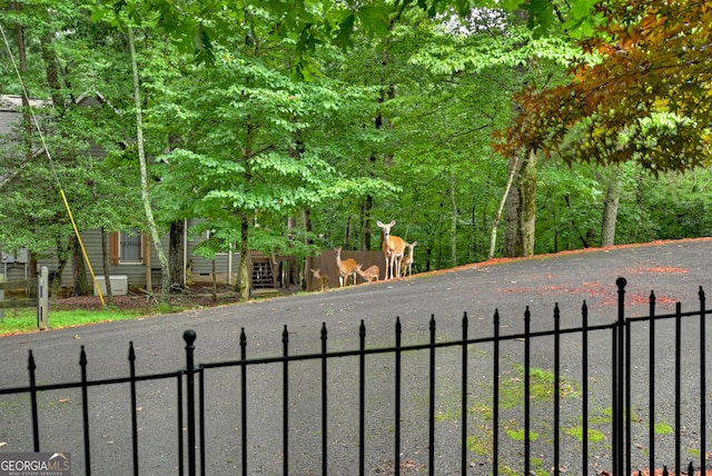 surrounding community featuring fence