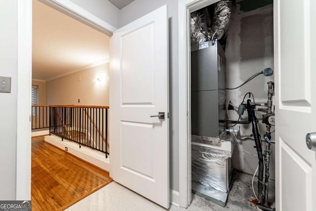 2626 Peachtree Rd NW Unit 412, Atlanta, GA 30305 - hall with ornamental molding and an upstairs landing